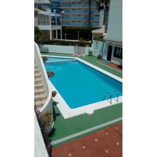 Cosy 3-bedroom Duplex with pool close to the beach