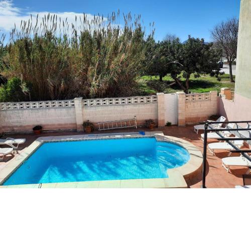 Cosy apartment close to the beach and heated pool.