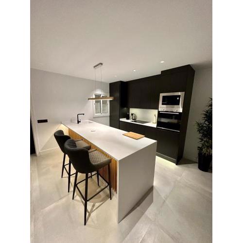 Designer loft with pool, with gigantic terrace and private parking & in the city centre