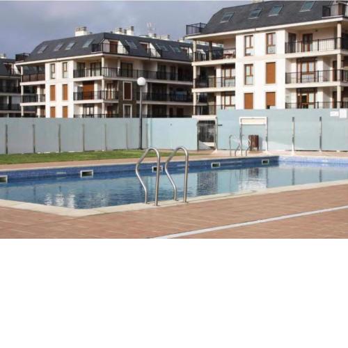 Dúplex al lado de la playa con terraza y piscina