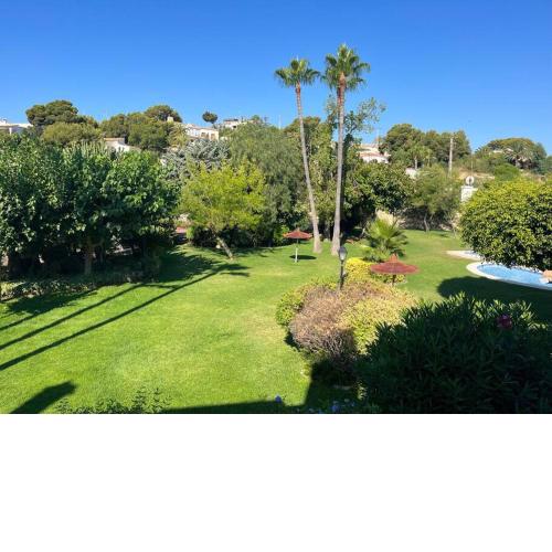 Duplex in residential complex with pool
