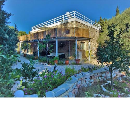 Eco Secluded hand built stone house in an oasis
