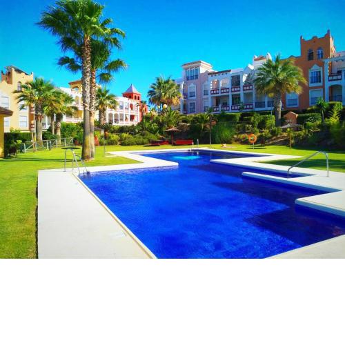 El ático de los flamencos, Apartamentos Living Sur