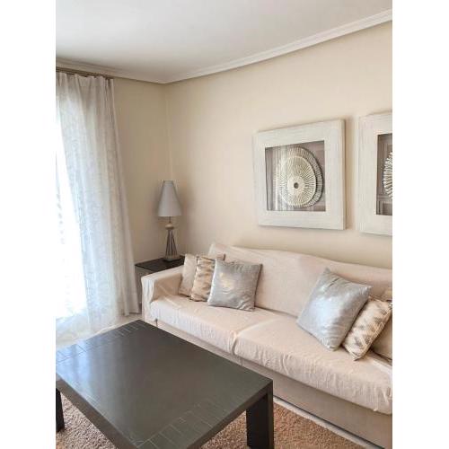 Elegant 2-Bedroom Apartment in Benidorm with Private Pool and Scenic Garden Views