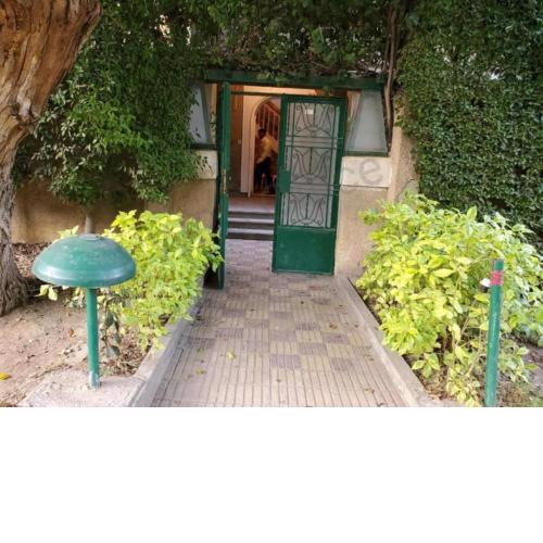 Elegant villa with private entrance, garden and swimming pool