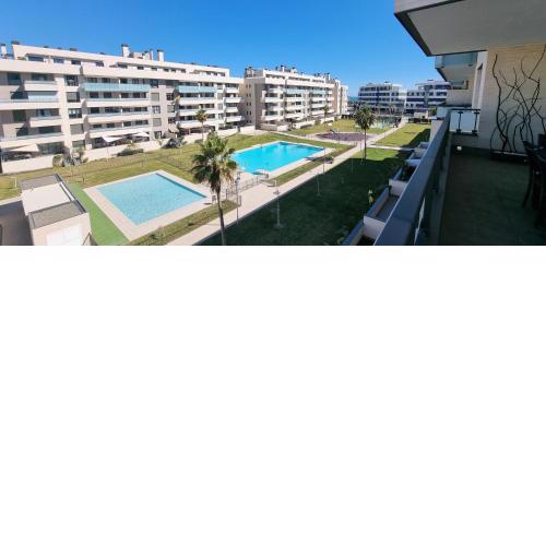 Excellent location- Beach, Pool, Telework, 2 Bikes, Parking & Wifi GRATIS at "CaSa Carol'S"