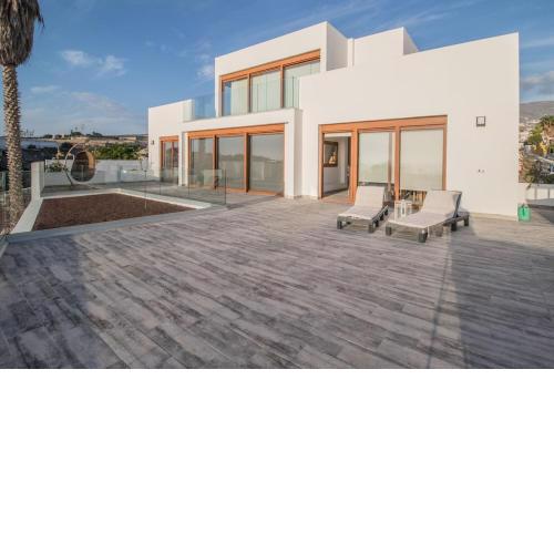Fabulous contemporary 5 bedroom villa with private heated pool, sleeps max 13