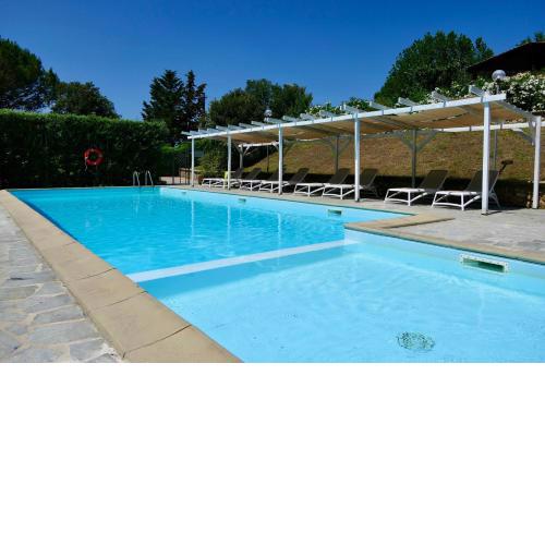 Farmhouse with swimming pool in Casale Marittimo surrounded by greenery