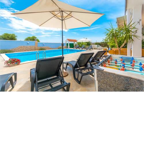 Five-Bedroom Holiday Home in Tinj