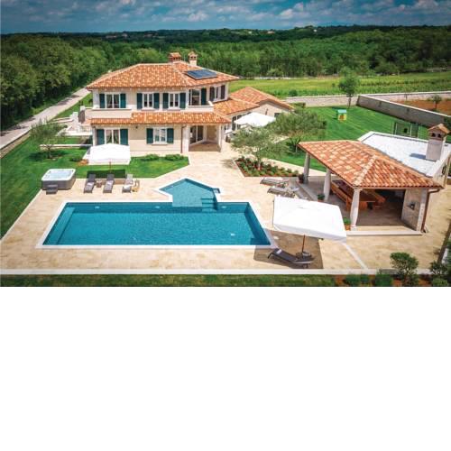 Five-Bedroom Holiday Home in Tinjan