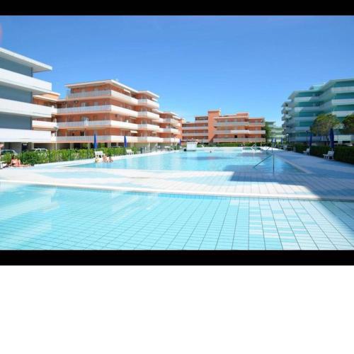 flat in a modern holiday resort with swimming pools - childrens play area