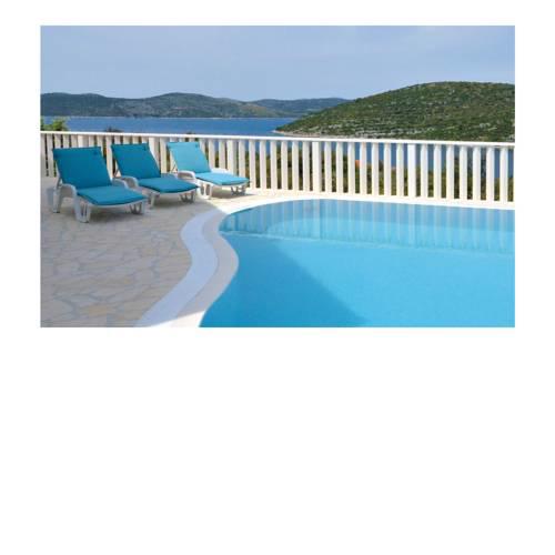 Four-Bedroom Holiday home Drvenik Veliki with Sea view 05