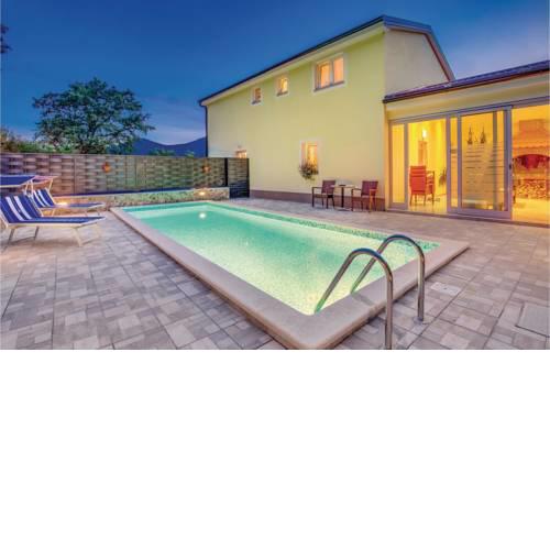 Four-Bedroom Holiday Home in Jurdani