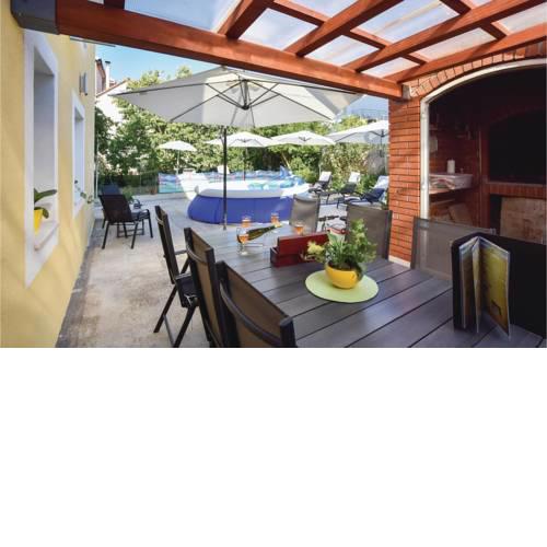 Four-Bedroom Holiday Home in Kastel Stafilic