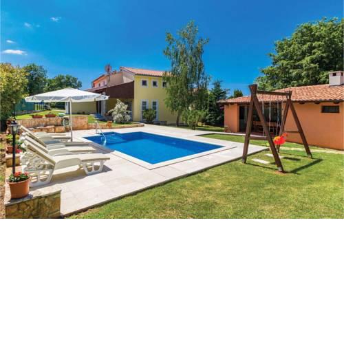 Four-Bedroom Holiday Home in Loborika