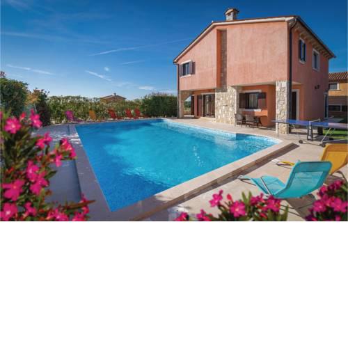 Four-Bedroom Holiday Home in Orihi