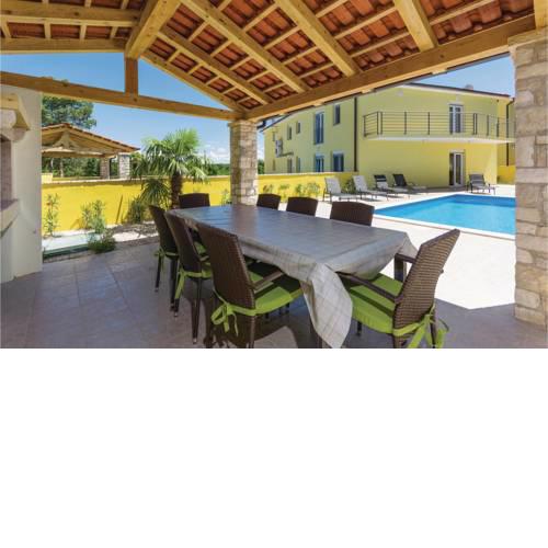 Four-Bedroom Holiday Home in Perci