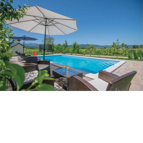 Four-Bedroom Holiday Home in Prolozac Donji