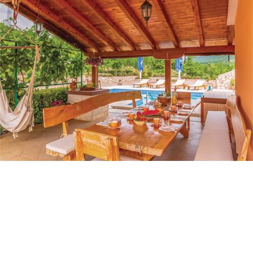 Four-Bedroom Holiday Home in Slivno