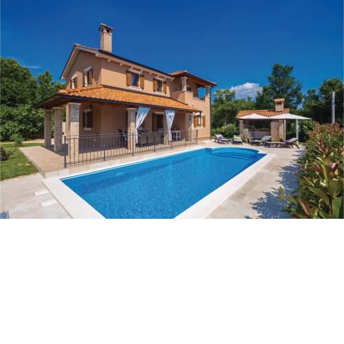Four-Bedroom Holiday home Kras with a Fireplace 09