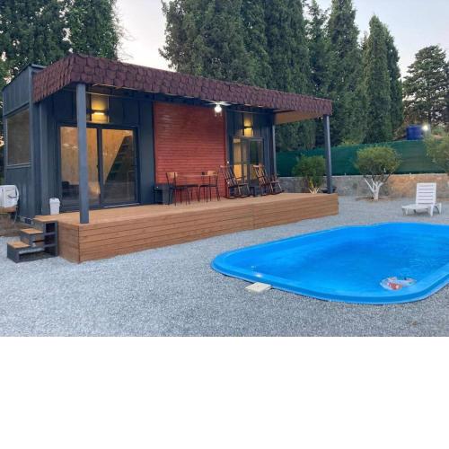 Gümüşlükte mustakil bahceli ve havuzlu tinyvilla