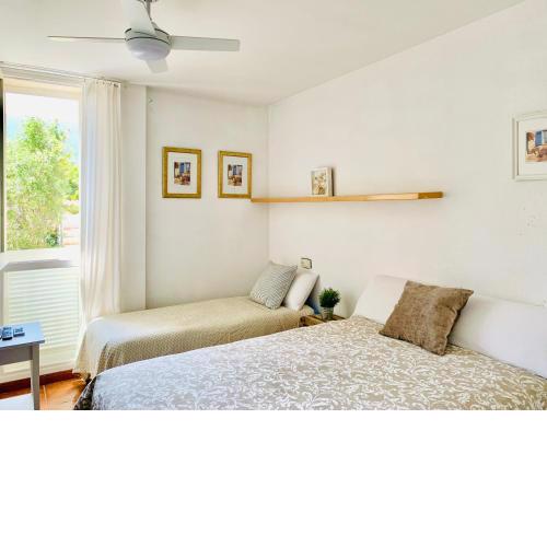 Habitación céntrica con Aire Acondicionado Baño privado Nevera