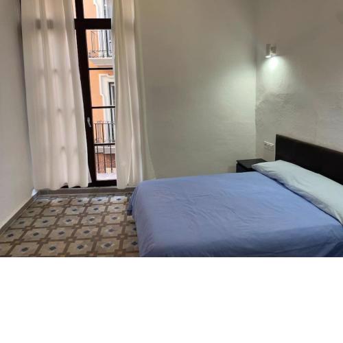 Habitación con baño compartido