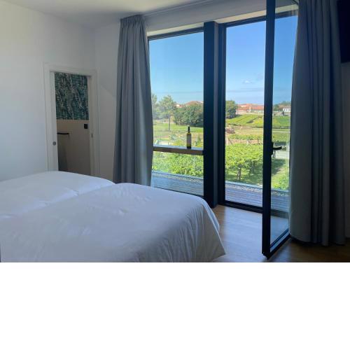 Habitación deluxe rodeada de viñedos