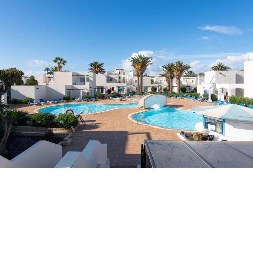 HomeforGuest Apartamento con terraza y piscina en Corralejo