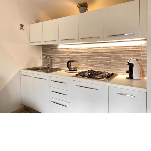 Homey Experience - Blu Suite Attic Seaview