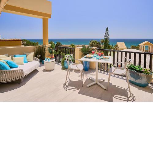 Honeymoon Corner Suite, sun-all-day terrace on the best beach of Marbella