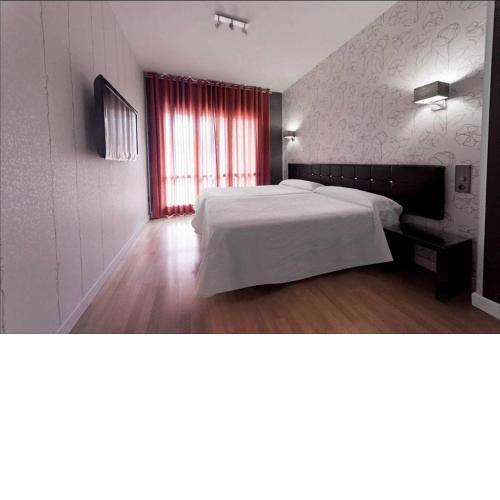 Hospedium Hostal Un Punto Chic