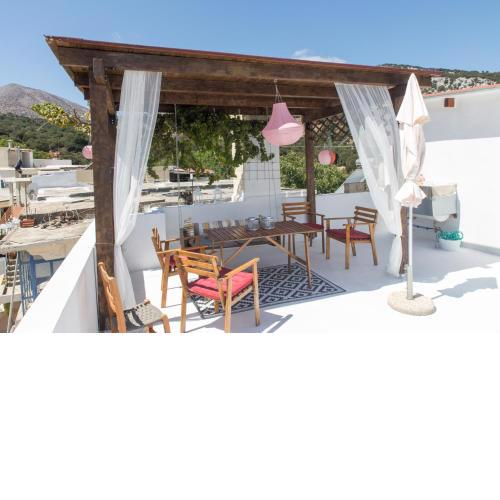 House with roof top terrace in a traditional village
