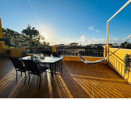 Huge balcony - view to golf course, sea & pools