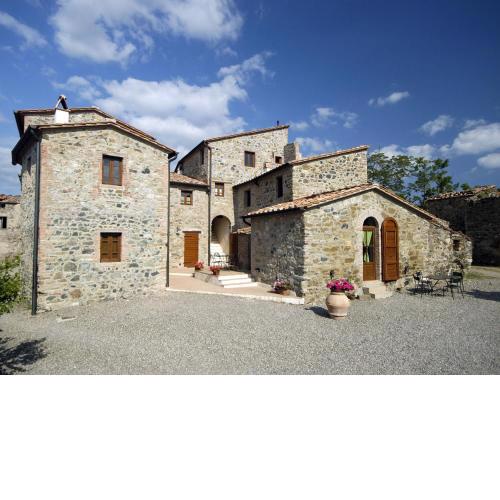 In a wonderful medieval village on the Tuscan hills, with air conditioning
