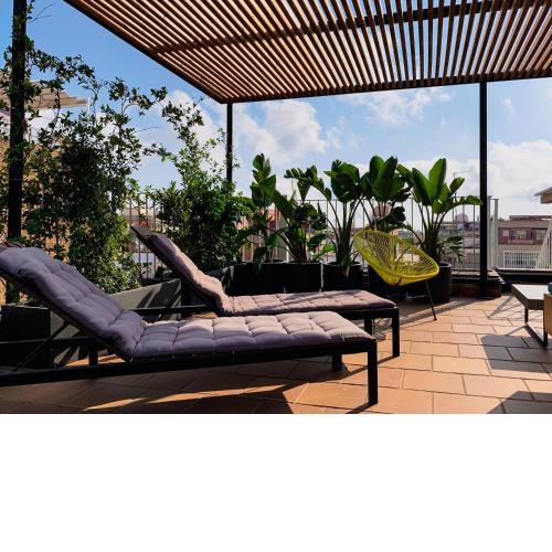Incredible 2BR Penthouse with Urban Rooftop Garden