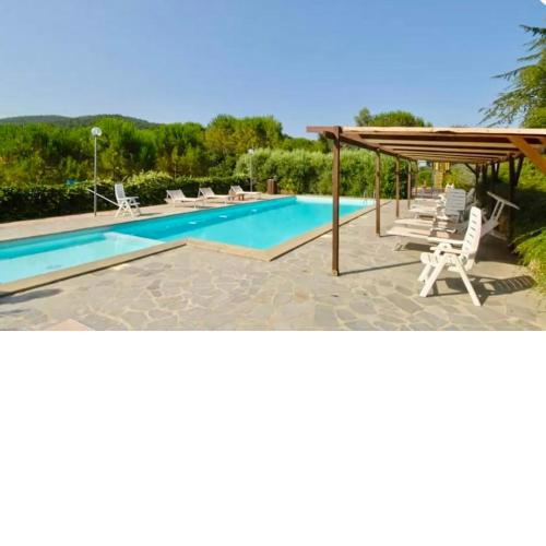 ISA-Farmhouse with swimming pool in the middle of the Tuscan nature