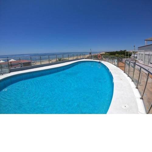 Islantilla primera linea de playa, piscina, parking