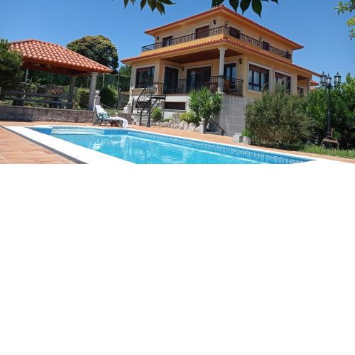 Itxi y Jamin - Chalet con vistas a la Ria de Vigo