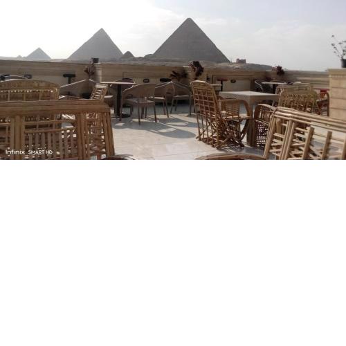 King Farouk pyramids view