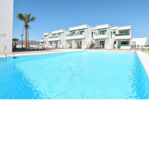 Las Mimosas. Bajo con Wifi. Piscinas comunitarias