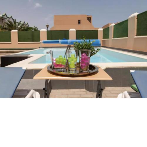 Lightbooking Esmeralda piscina privada Caleta de Fuste