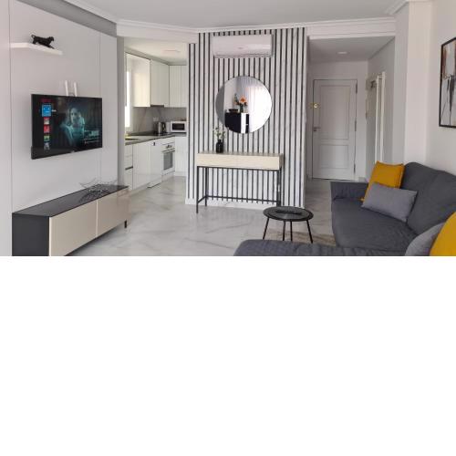 lovely sunny apartment with shared pool and private parking