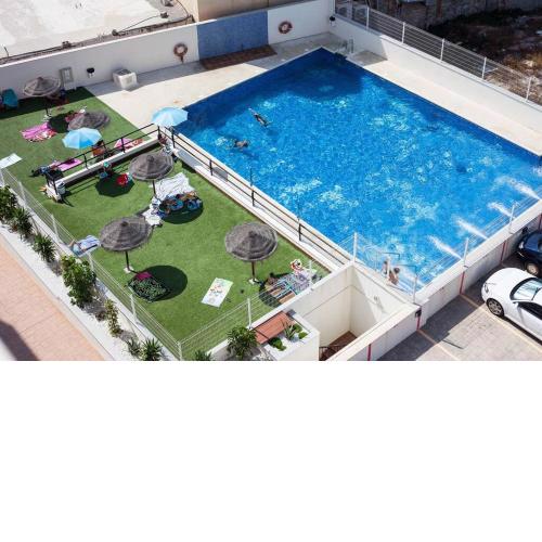 Magnífico Atico 1 dormitorio con Vistas al mar y Piscina Solarium Wifi y Netfix