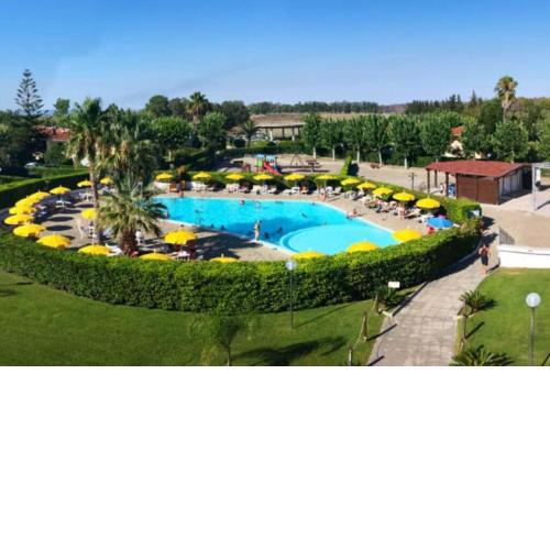Metaponto. Appartamento in villaggio con piscina