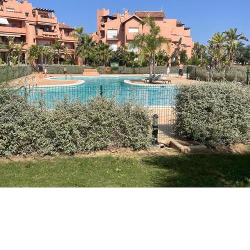 Modern apartment in golf resort with heated pool