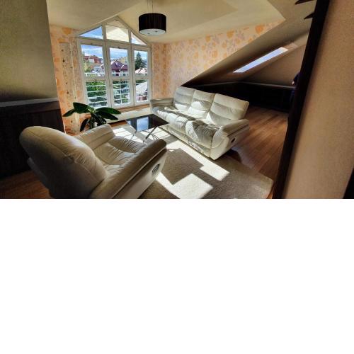 Modern attic apartment in centre, 140m2, with terrace