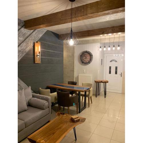 modern rustic house in the heart Of the village