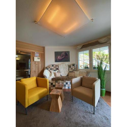 Modernes Alpenapartment mit Sauna / Whirpool / Pool / Wintergarten