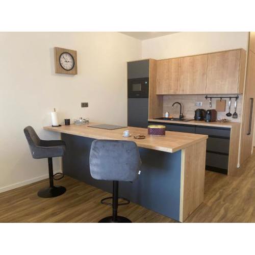 Moderný apartmán A408 v centre NR, parkovanie v cene
